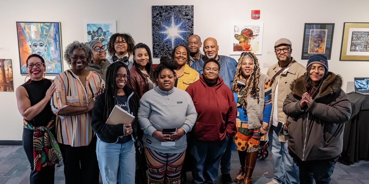 A group of students and AACC faculty in the Pascal Gallery.