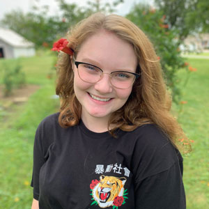 Headshot of Keegan Kauffman outside.