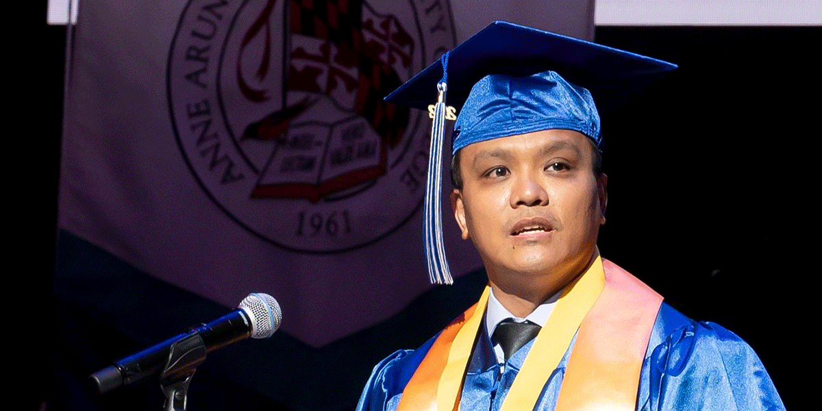 Mario Guzman speaking at Commencement