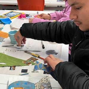 Student working on art project.