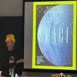 Person presenting the design of a magazine cover and inside article