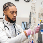 Nursing student with a syringe