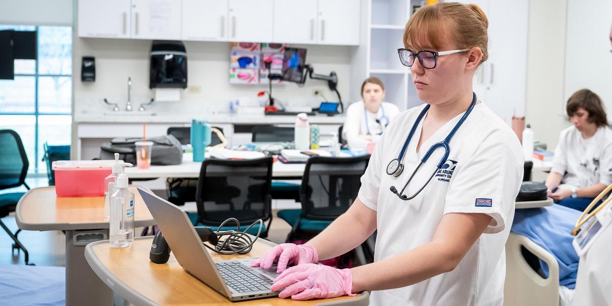 Nursing student using a laptop