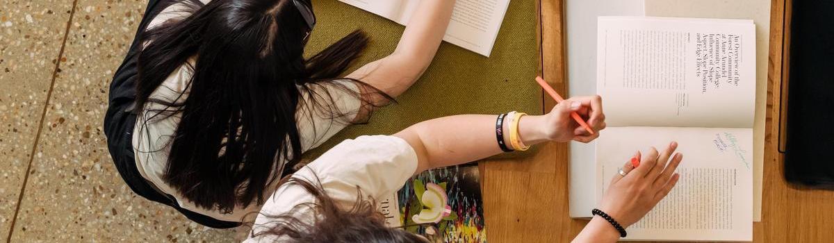 Students writing in journals